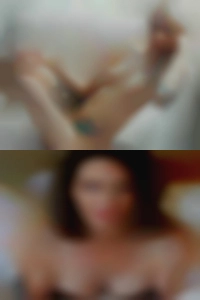 A naked girls discreet beer drinking.